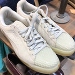 Previously owned Puma sneakers. #0